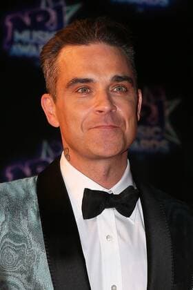 213403 Francois Glories Starface 2016-11-12 Cannes France NRJ Music Awards 2016. FRANCE Cannes 12-11-2016. The English singer Robbie Williams and the French singer Jenifer arrive on the red carpet for 18th NRJ Music Awards in Cannes (South of France).  Copyright: xFrancoisxGloriesx xStarfacex STAR_213403_187