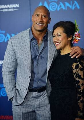 Dwayne Johnson (L) and his mother Ata Johnson arrive at the world premiere of Walt Disney Animation Studios Moana at Hollywood s El Capitan Theatre in Los Angeles, California on November 14, 2016.  LAP20161114406 CHRISTINExCHEW