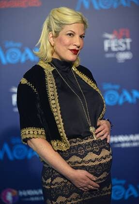 Tori Spelling shows off her baby bump as she arrives at the world premiere of Walt Disney Animation Studios Moana at Hollywood s El Capitan Theatre in Los Angeles, California on November 14, 2016. The premiere is part of the lineup for AFI FEST 2016.  LAP20161114418 CHRISTINExCHEW