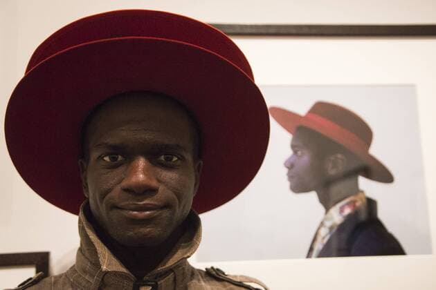 Taylor Wessing Photographic Portrait Prize 2016, National Portrait Gallery, London, UK London, UK. 16 November 2016. Abdel Queta Tavares poses in front of his portrait Abdel taken by photographer David Cantor. Press preview of the Taylor Wessing Photographic Portrait Prize 2016 at the National Portrait Gallery. The exhibition of the winning entries and shortlisted portraits runs from 17 November 2016 to 26 February 2017.