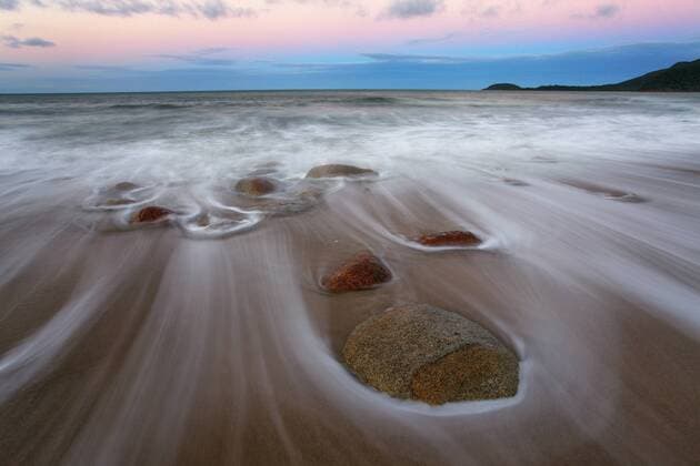 Little Ramsay Bay at dusk, Hinchinbrook Island National Park, Queensland, Australia CopyrightxDennisxHarding AUSCAPExAllxrightsxreserved