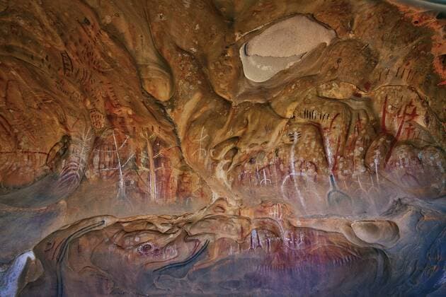 Aboriginal rock paintings at Arkaroo Rock, named after Arkurra, the Dreaming Serpent responsible for creating much of the landscape of the Flinders Ranges, according to the local Adnyamathanha people. ItâÄ™s probable the oldest paintings date from 6000 years ago. Flinders Ranges National Park, South Australia CopyrightxDennisxHarding AUSCAPExAllxrightsxreserved