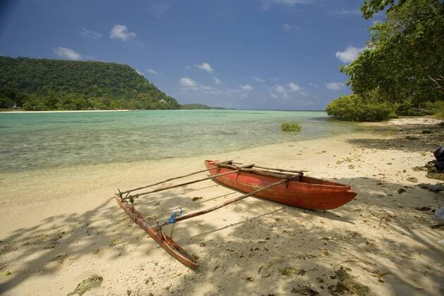 Outrigger canoe beached. Ifira Island near Port Vila, Efte, Vanuatu CopyrightÂNickxRains AUSCAPExAllxrightsxreserved