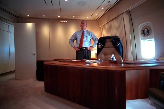 September 11, 2001 - United States - U.S. President George W. Bush watches television news coverage of the World Trade Center terrorist attacks from his office aboard Air Force One September 11, 2001. United States - ZUMAp138 20010911_zaa_p138_033