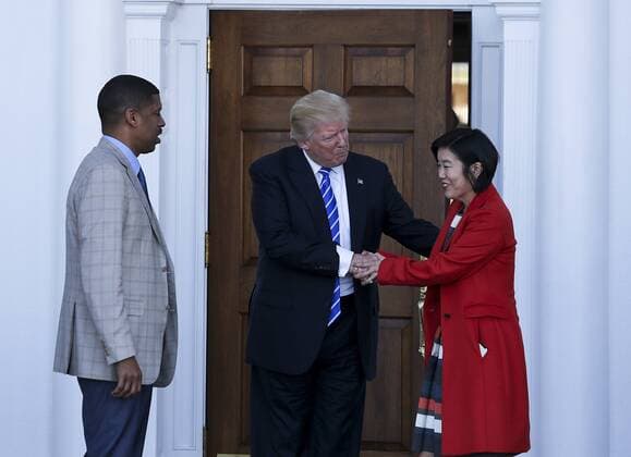 November 19, 2016 - Bedminster Township, New Jersey, United States of America - United States President-elect Donald Trump (C) greets Mayor of Sacramento, CA, Kevin Johnson (L) and former chancellor of Washington DC public schools Michelle Rhee (R), at the clubhouse of Trump International Golf Club, November 19, 2016 in Bedminster Township, New Jersey. .Credit: Pool via CNP Bedminster Township United States of America - ZUMAs152 20161119_zaa_s152_005