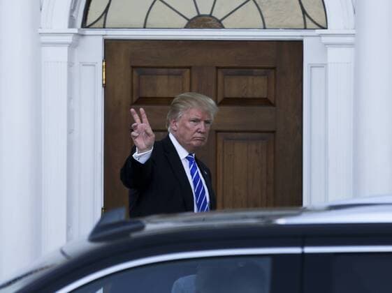 President-elect Donald Trump re-enters to the clubhouse of Trump International Golf Club, November 19, 2016 in Bedminster Township, New Jersey. Pool photo by Aude Guerrucc  TPX20161119223 AUDExGUERRUCCI