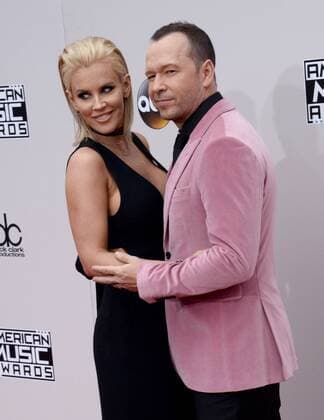 Actress Jenny McCarthy (L) and recording artist Donnie Wahlberg arrive for the 2016 American Music Awards held at Microsoft Theater in Los Angeles on November 20, 2016.  LAP20161120123 JIMxRUYMEN