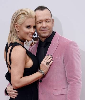 Actress Jenny McCarthy (L) and recording artist Donnie Wahlberg arrive for the 2016 American Music Awards held at Microsoft Theater in Los Angeles on November 20, 2016.  LAP20161120131 JIMxRUYMEN