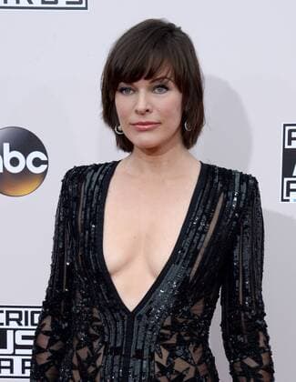 Actress Milla Jovovich arrives for the 2016 American Music Awards held at Microsoft Theater in Los Angeles on November 20, 2016.  LAP20161120200 JIMxRUYMEN