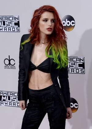 Actress Bella Thorne arrives for the 2016 American Music Awards held at Microsoft Theater in Los Angeles on November 20, 2016.  LAP20161120219 JIMxRUYMEN