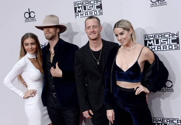 Recording artists Brian Kelley (2nd from L) and Tyler Hubbard (2nd from R) of musical group Florida Georgia Line arrive for the 2016 American Music Awards held at Microsoft Theater in Los Angeles on November 20, 2016.  LAP20161120316 JIMxRUYMEN