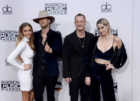 American Music Awards in Los Angeles Recording artists Brian Kelley (2nd from L) and Tyler Hubbard (2nd from R) of musical group Florida Georgia Line arrive for the 2016 American Music Awards held at Microsoft Theater in Los Angeles on November 20, 2016.  LAP20161120317 JIMxRUYMEN