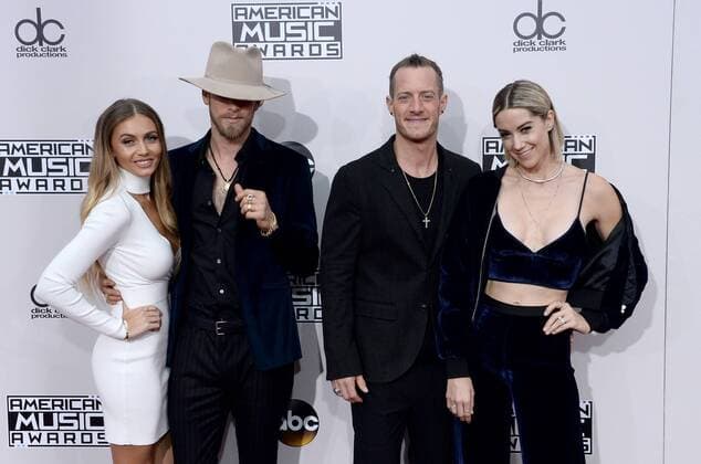 Recording artists Brian Kelley (2nd from L) and Tyler Hubbard (2nd from R) of musical group Florida Georgia Line arrive for the 2016 American Music Awards held at Microsoft Theater in Los Angeles on November 20, 2016.  LAP20161120318 JIMxRUYMEN