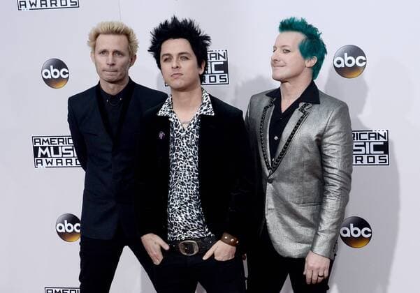 (L-R) Musicians Mike Dirnt, Billie Joe Armstrong and Tre Cool of Green Day arrive for the 2016 American Music Awards held at Microsoft Theater in Los Angeles on November 20, 2016.  LAP20161120309 JIMxRUYMEN