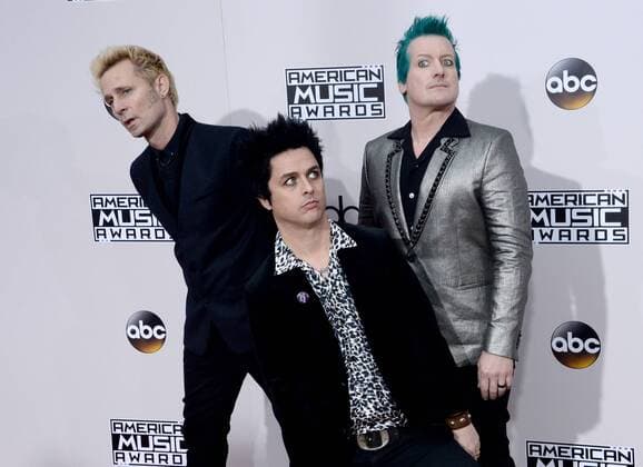 (L-R) Musicians Mike Dirnt, Billie Joe Armstrong and Tre Cool of Green Day arrive for the 2016 American Music Awards held at Microsoft Theater in Los Angeles on November 20, 2016.  LAP20161120308 JIMxRUYMEN