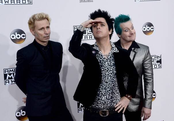 (L-R) Musicians Mike Dirnt, Billie Joe Armstrong and Tre Cool of Green Day arrive for the 2016 American Music Awards held at Microsoft Theater in Los Angeles on November 20, 2016.  LAP20161120312 JIMxRUYMEN