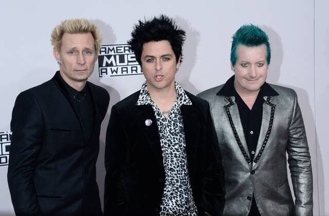 (L-R) Musicians Mike Dirnt, Billie Joe Armstrong and Tre Cool of Green Day arrive for the 2016 American Music Awards held at Microsoft Theater in Los Angeles on November 20, 2016.  LAP20161120314 JIMxRUYMEN