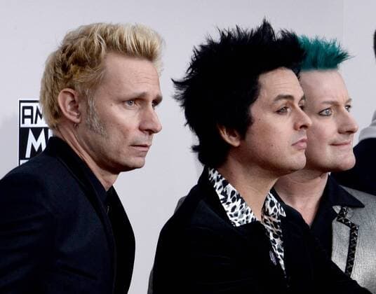 (L-R) Musicians Mike Dirnt, Billie Joe Armstrong and Tre Cool of Green Day arrive for the 2016 American Music Awards held at Microsoft Theater in Los Angeles on November 20, 2016.  LAP20161120315 JIMxRUYMEN