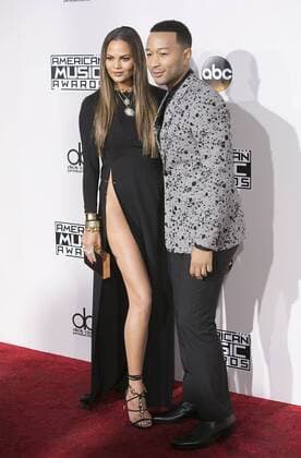 November 20, 2016 - Los Angeles, California, U.S - John Legend and Chrissy Teigen on the Red Carpet of the 2016 American Music Awards held on Sunday, November 20, 2016 at the Microsoft Theatre in Los Angeles, California. Los Angeles U.S. - ZUMAp124 20161120_zaa_p124_090
