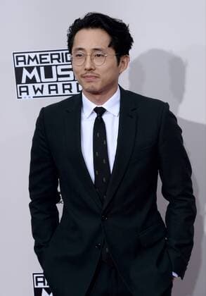 Actor Steven Yeun arrives for the 2016 American Music Awards held at Microsoft Theater in Los Angeles on November 20, 2016.  LAP20161120424 JIMxRUYMEN