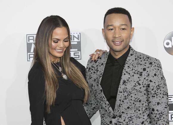 November 20, 2016 - Los Angeles, California, U.S - John Legend and Chrissy Teigen on the Red Carpet of the 2016 American Music Awards held on Sunday, November 20, 2016 at the Microsoft Theatre in Los Angeles, California. Los Angeles U.S. - ZUMAp124 20161120_zaa_p124_088
