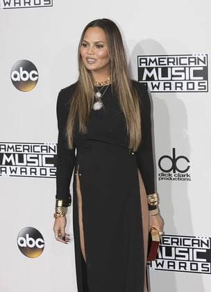 November 20, 2016 - Los Angeles, California, U.S - Chrissy Teigen on the Red Carpet of the 2016 American Music Awards held on Sunday, November 20, 2016 at the Microsoft Theatre in Los Angeles, California. Los Angeles U.S. - ZUMAp124 20161120_zaa_p124_092