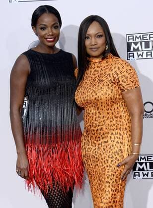 Entrepreneur Tai Beauchamp (L) and actress Garcelle Beauvais arrive for the 2016 American Music Awards held at Microsoft Theater in Los Angeles on November 20, 2016.  LAP20161120512 JIMxRUYMEN