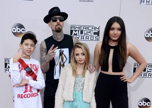 American Music Awards in Los Angeles Recording artist Travis Barker arrives with his family for the 2016 American Music Awards held at Microsoft Theater in Los Angeles on November 20, 2016.  LAP20161120521 JIMxRUYMEN