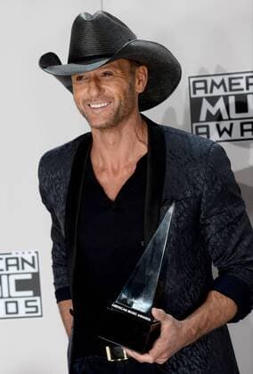 Singer-songwriter Tim McGraw appears backstage with the award for Favorite Country Song during the 2016 American Music Awards held at Microsoft Theater in Los Angeles on November 20, 2016.  LAP20161120573 JIMxRUYMEN