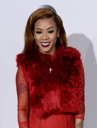 Singer Keyshia Cole arrives for the 2016 American Music Awards held at Microsoft Theater in Los Angeles on November 20, 2016.  LAP20161120599 JIMxRUYMEN