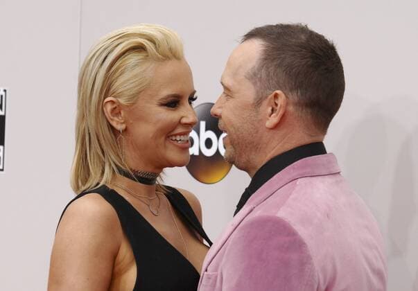 Donnie Wahlberg & wife Jenny McCarthy AMERICAN MUSIC AWARDS: ARRIVALS Los Angeles Patrick Rideaux PicturePerfect