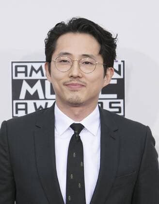 November 20, 2016 - Los Angeles, California, U.S - Steven Yeun on the Red Carpet of the 2016 American Music Awards held on Sunday, November 20, 2016 at the Microsoft Theatre in Los Angeles, California. Los Angeles U.S. - ZUMAp124 20161120_zaa_p124_180