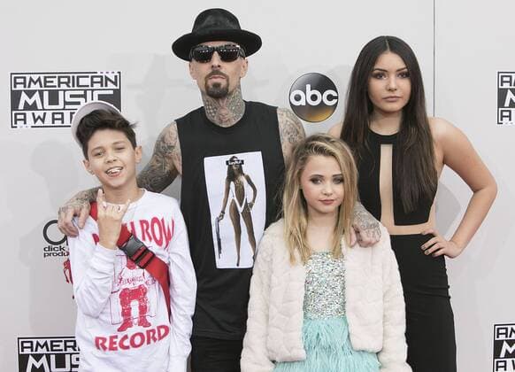 November 20, 2016 - Los Angeles, California, U.S - Travis Barker with his family on the Red Carpet of the 2016 American Music Awards held on Sunday, November 20, 2016 at the Microsoft Theatre in Los Angeles, California. Los Angeles U.S. - ZUMAp124 20161120_zaa_p124_183