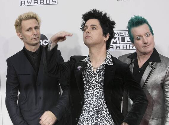 November 20, 2016 - Los Angeles, California, U.S - (L-R) Recording artists Mike Dirnt, Billie Joe Armstrong and Tre Cool of Green Day on the Red Carpet of the 2016 American Music Awards held on Sunday, November 20, 2016 at the Microsoft Theatre in Los Angeles, California. Los Angeles U.S. - ZUMAp124 20161120_zaa_p124_207