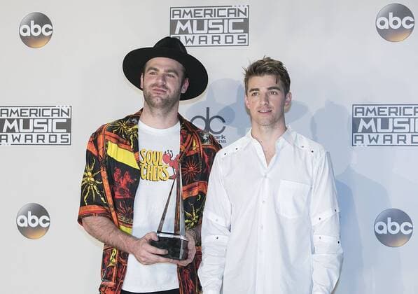 November 20, 2016 - Los Angeles, California, U.S - Alex Pall (L) and Drew Taggart of The Chainsmokers pose with the Favorite EDM Artist award in the Press Room of the 2016 American Music Awards held on Sunday, November 20, 2016 at the Microsoft Theatre in Los Angeles, California. Los Angeles U.S. - ZUMAp124 20161120_zaa_p124_264