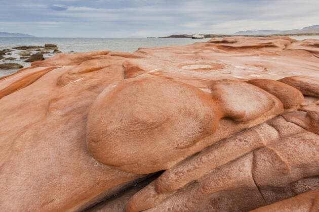 Wind-eroded sandstone rock formations in El Gato Bay, Baja California Sur, Mexico, North America Copyright: MichaelxNolan 1112-2172