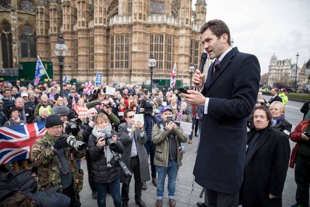 November 23, 2016 - London, London, UK - London, UK. UKIP leadership candidate John Rees Evans campaigns with demonstrators outside the Houses of Parliament for a hard Brexit on the day Chancellor of the Exchequer Philip Hammond releases the autumn statement. London UK  - ZUMAl94_ 20161123_zaf_l94_092