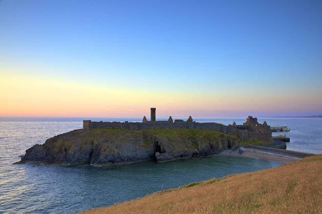 Peel Castle at sunset, St. Patrick s Isle, Isle of Man, Europe Copyright: NeilxFarrin 1126-862