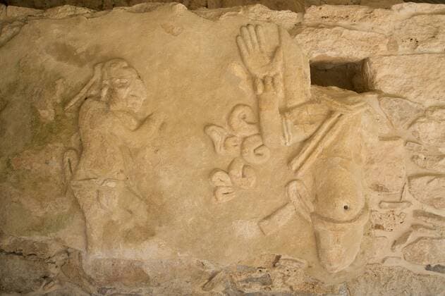 Figures of stucco relief, skeletal heads found in the niches, Castillo de Kukulcan, Mayapan, Mayan archaeological site, Yucatan, Mexico,. North America Copyright: RichardxMaschmeyer 801-1481