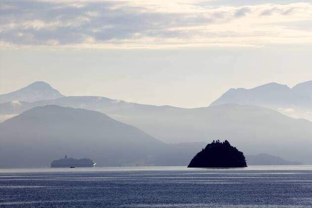 A Hurtigruten cruise boat in the fjords of Norway, Scandinavia, Europe Copyright: OlivierxGoujon 814-1552