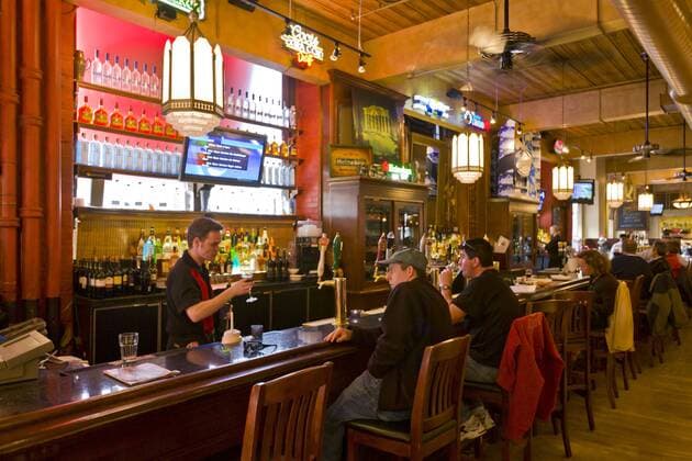 Patrons enjoying a drink at a pub, Toronto, Ontario, Canada, North America Copyright: StuartxDee 821-167