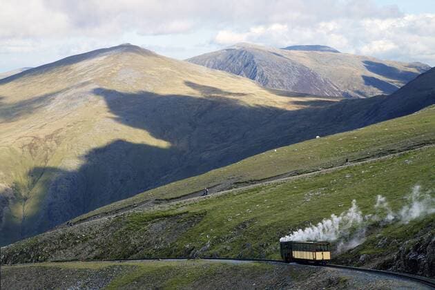 Steam engine and passenger carriage on trip down Snowdon Mountain Railway, Snowdonia National Park, Gwynedd, Wales, United Kingdom, Europe Copyright: PeterxBarritt 831-1497