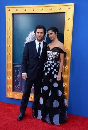 Cast member Matthew McConaughey, the voice of Buster Moon in the animated motion picture comedy Sing and his wife, model Camila Alves attend the premiere of the film the Microsoft Theater in Los Angeles on December 3, 2016. Storyline: A koala named Buster Moon has one final chance to restore his theater to its former glory by producing the world s greatest singing competition.  LAP2016120315 JIMxRUYMEN