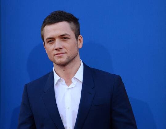 Cast member Taron Egerton, the voice of Johnny in the animated motion picture comedy Sing attends the premiere of the film at the Microsoft Theater in Los Angeles on December 3, 2016. Storyline: A koala named Buster Moon has one final chance to restore his theater to its former glory by producing the world s greatest singing competition.  LAP2016120320 JIMxRUYMEN