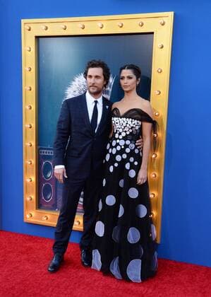 Cast member Matthew McConaughey, the voice of Buster Moon in the animated motion picture comedy Sing and his wife, model Camila Alves attend the premiere of the film the Microsoft Theater in Los Angeles on December 3, 2016. Storyline: A koala named Buster Moon has one final chance to restore his theater to its former glory by producing the world s greatest singing competition.  LAP2016120318 JIMxRUYMEN