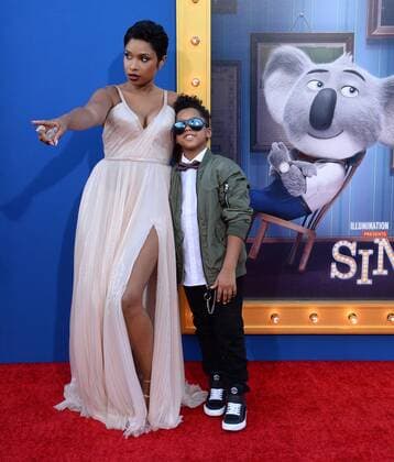 Cast member Jennifer Hudson, the voice of Young Nana Noodleman in the animated motion picture comedy Sing and her son David Daniel Otunga, Jr., attend the premiere of the film at the Microsoft Theater in Los Angeles on December 3, 2016. Storyline: A koala named Buster Moon has one final chance to restore his theater to its former glory by producing the world s greatest singing competition.  LAP2016120332 JIMxRUYMEN