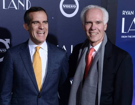 Mayor Eric Garcetti (L) and his father, former L.A. district attorney Gil Garcetti attend the premiere of the motion picture musical comedy La La Land at Mann Village Theater in the Westwood section of Los Angeles on December 6, 2016. Storyline: A jazz pianist falls for an aspiring actress in Los Angeles.  LAP2016120630 JIMxRUYMEN