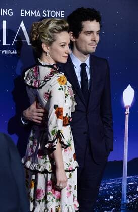 Director writer Damien Chazelle and a guest attend the premiere of the motion picture musical comedy La La Land at Mann Village Theater in the Westwood section of Los Angeles on December 6, 2016. Storyline: A jazz pianist falls for an aspiring actress in Los Angeles.  LAP2016120636 JIMxRUYMEN