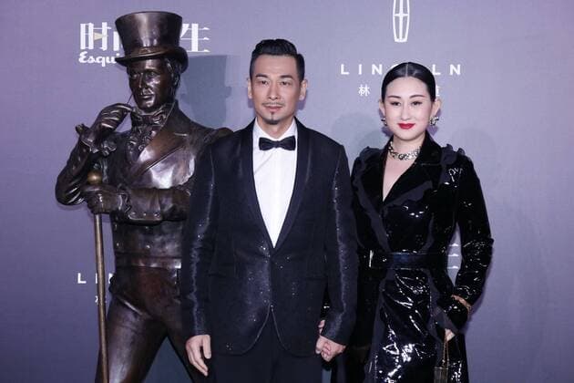 BEIJING, CHINA - DECEMBER 07: Actor Vincent Zhao Wenzhuo and wife Zhang Danlu pose on the red carpet of the 13th Man At His Best Award at the Worker s Stadium on December 7, 2016 in Beijing, China.  CFP496717246
