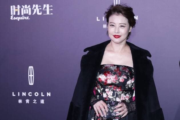 BEIJING, CHINA - DECEMBER 07: Actress Kathy Chow Hoi-Mei poses on the red carpet of the 13th Man At His Best Award at the Worker s Stadium on December 7, 2016 in Beijing, China.  CFP496717249